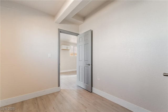 unfurnished room featuring light hardwood / wood-style floors