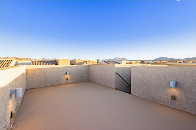 view of patio with a balcony