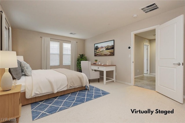 bedroom with carpet, visible vents, and baseboards