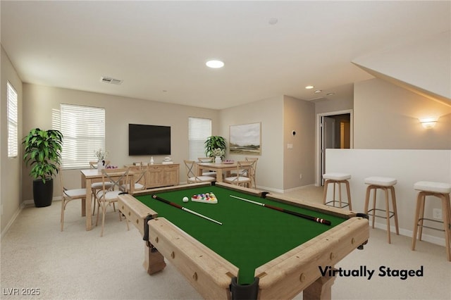 recreation room featuring baseboards, recessed lighting, visible vents, and light colored carpet