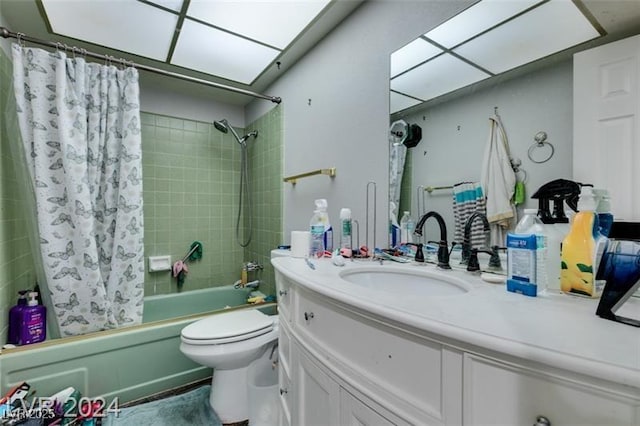 full bathroom featuring toilet, shower / tub combo, and vanity