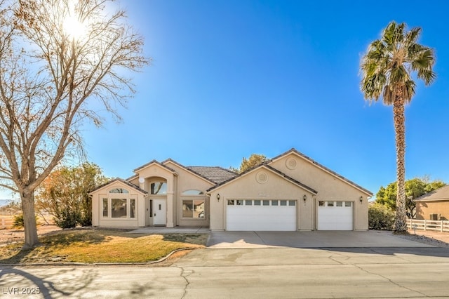 view of front of property featuring a garage