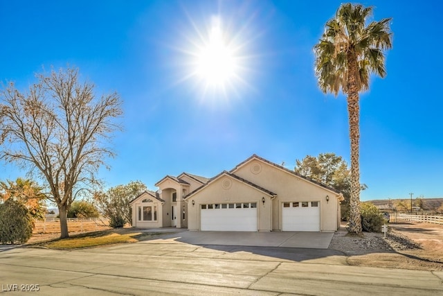 view of front of home with a garage