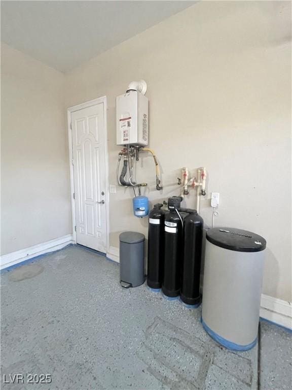 utility room featuring water heater