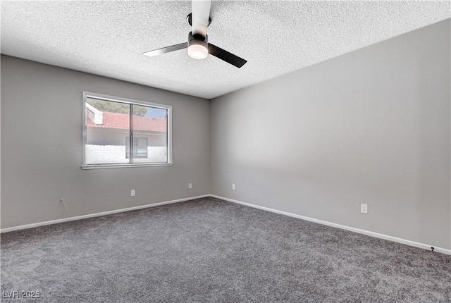 spare room with a textured ceiling, ceiling fan, and carpet