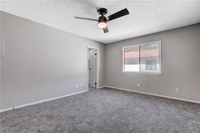 carpeted empty room featuring a textured ceiling and ceiling fan