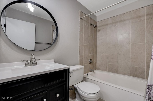 full bathroom featuring shower / bath combo with shower curtain, toilet, and vanity