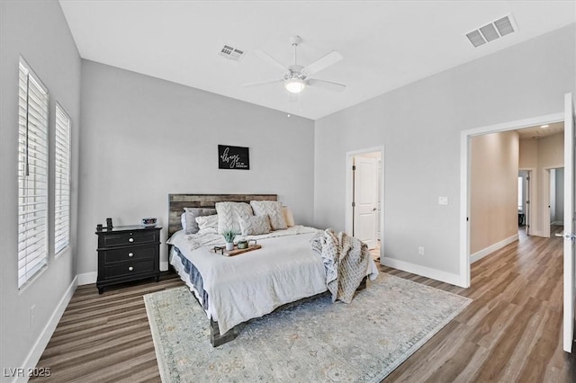 bedroom featuring hardwood / wood-style floors and ceiling fan