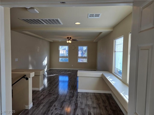 spare room featuring dark hardwood / wood-style flooring