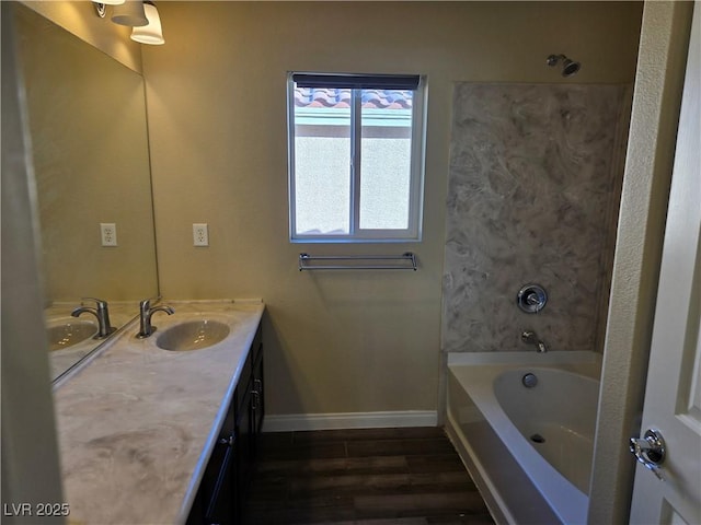 bathroom with hardwood / wood-style floors and vanity