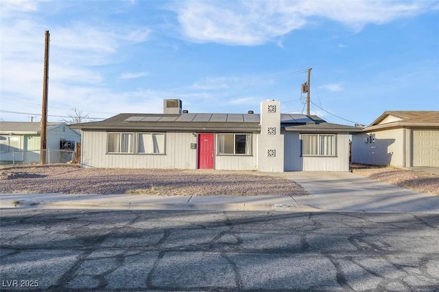 view of front of home with solar panels