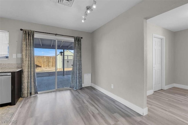 unfurnished living room featuring light hardwood / wood-style flooring