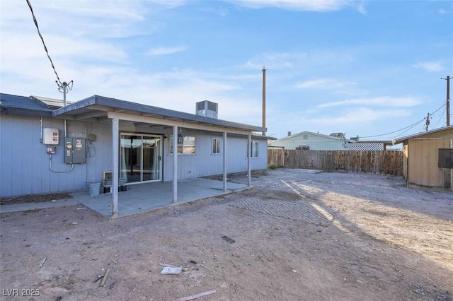 rear view of house featuring a patio