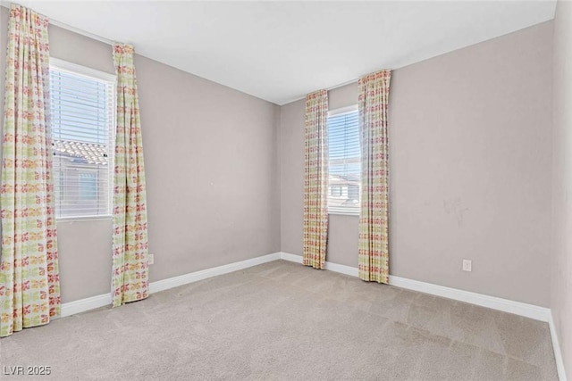 unfurnished room with carpet floors