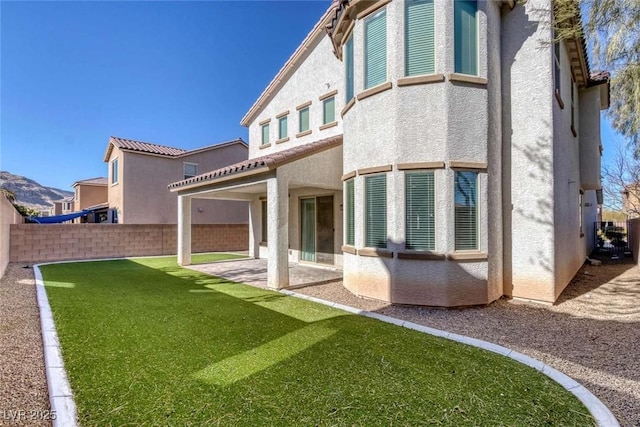 rear view of property with a patio area