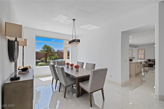 dining room with an inviting chandelier