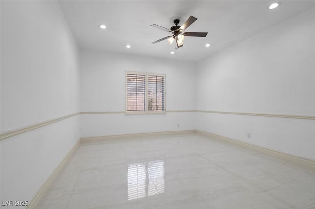 unfurnished room featuring ceiling fan and light tile patterned floors