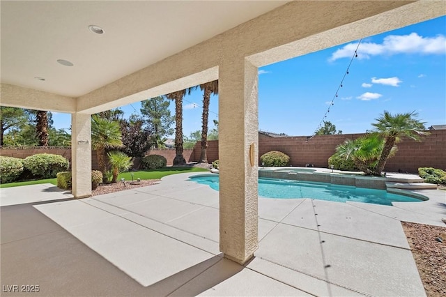 view of swimming pool featuring a patio