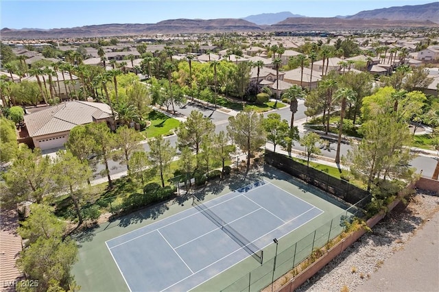 birds eye view of property featuring a mountain view