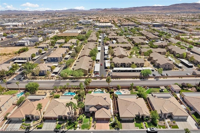 bird's eye view with a mountain view