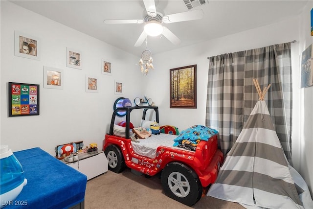 carpeted bedroom with ceiling fan