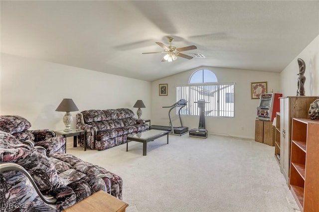 living room with carpet floors, lofted ceiling, and ceiling fan