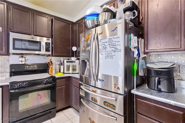 kitchen with decorative backsplash, dark brown cabinets, light tile patterned flooring, and stainless steel appliances