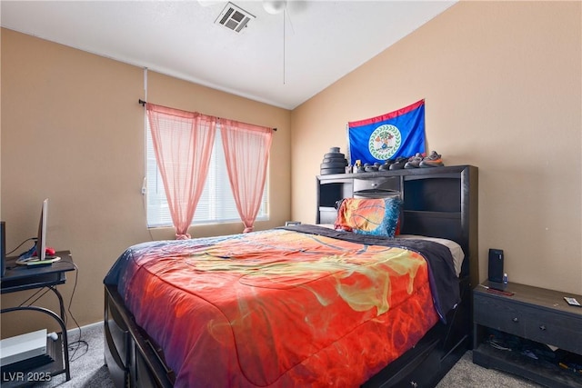 bedroom featuring carpet and lofted ceiling