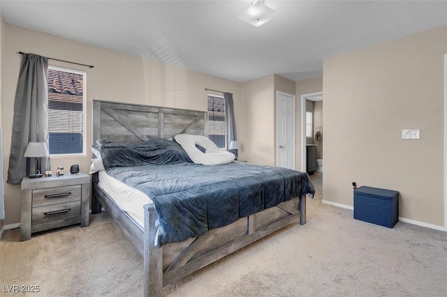 bedroom with light colored carpet