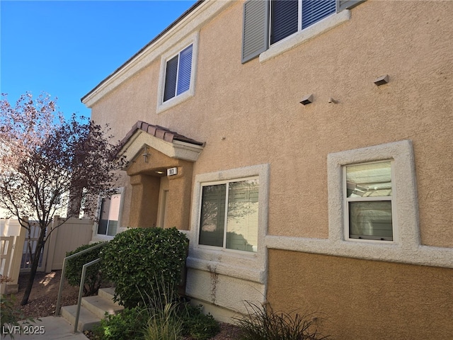 exterior space featuring stucco siding