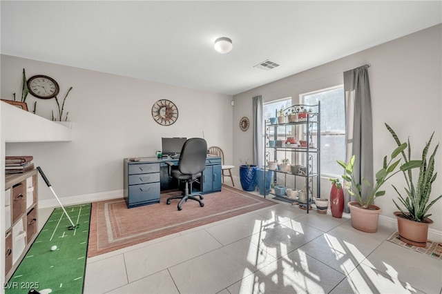 office space featuring light tile patterned floors