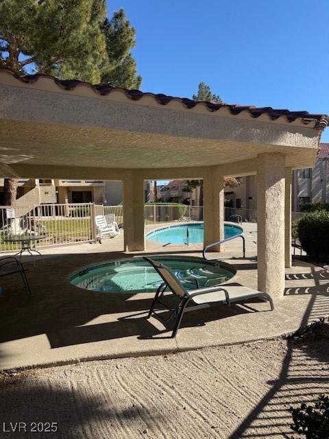 view of swimming pool featuring a patio