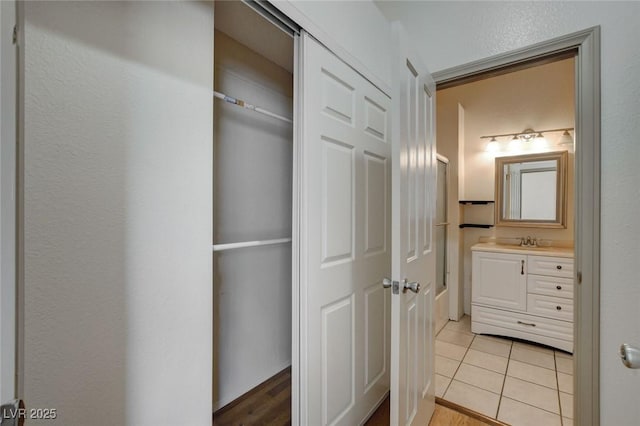 interior space featuring vanity and tile patterned flooring