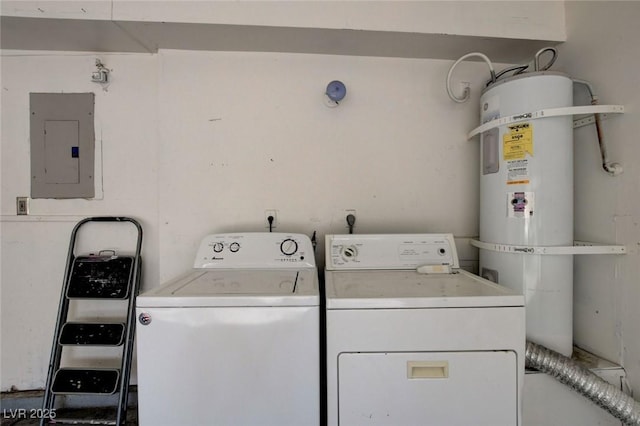 washroom featuring water heater, separate washer and dryer, and electric panel