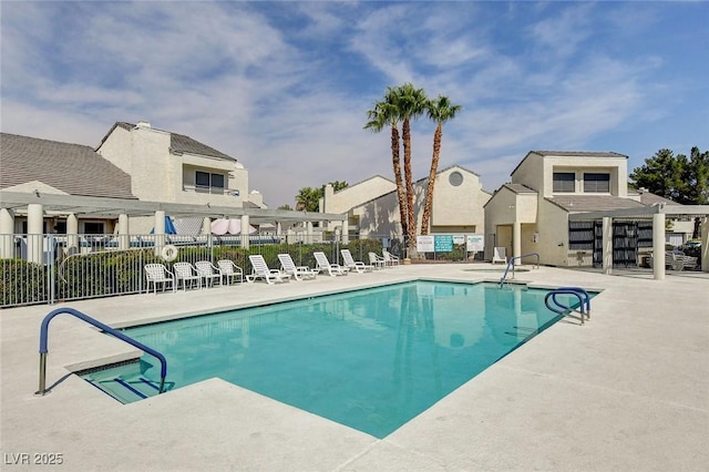 view of pool featuring a patio