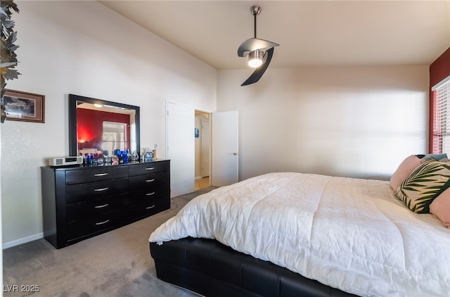 bedroom featuring light carpet and ceiling fan