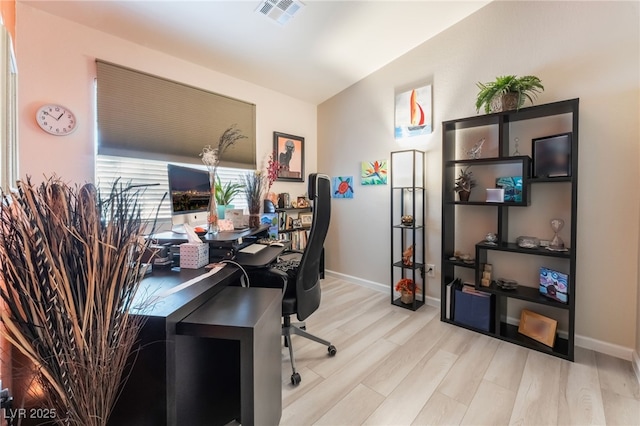 office space featuring light wood-type flooring