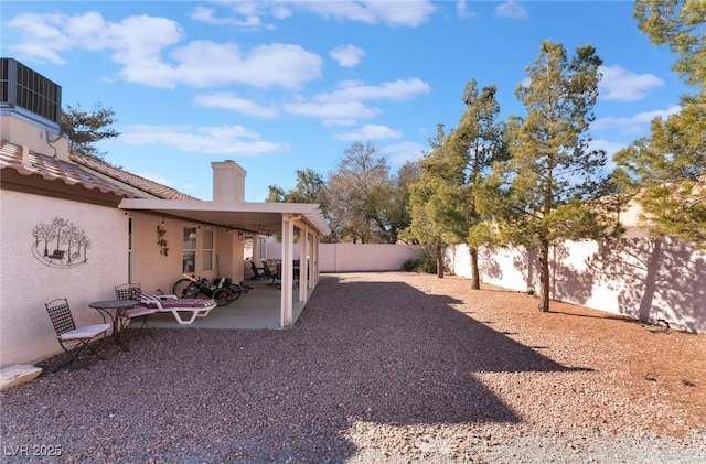 view of yard featuring a patio area and cooling unit