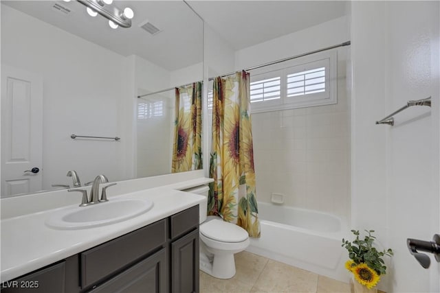 full bathroom featuring toilet, vanity, tile patterned flooring, and shower / bath combination with curtain