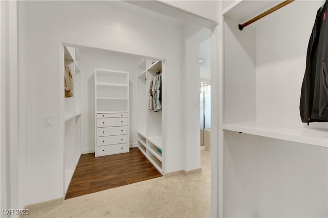 spacious closet featuring tile patterned floors