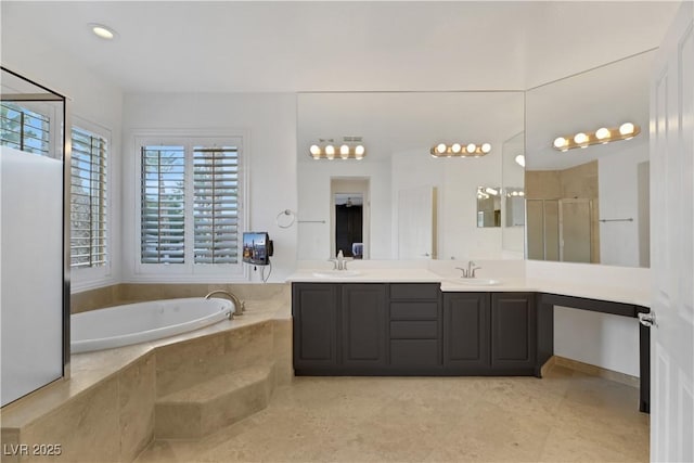 bathroom with separate shower and tub, vanity, and tile patterned flooring