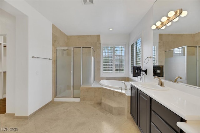 bathroom featuring plus walk in shower, tile patterned floors, and vanity