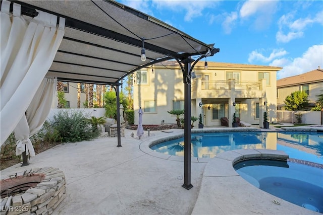 view of swimming pool with a patio area