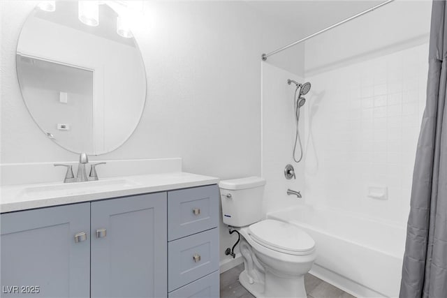 full bathroom with vanity, toilet, and shower / bath combo with shower curtain