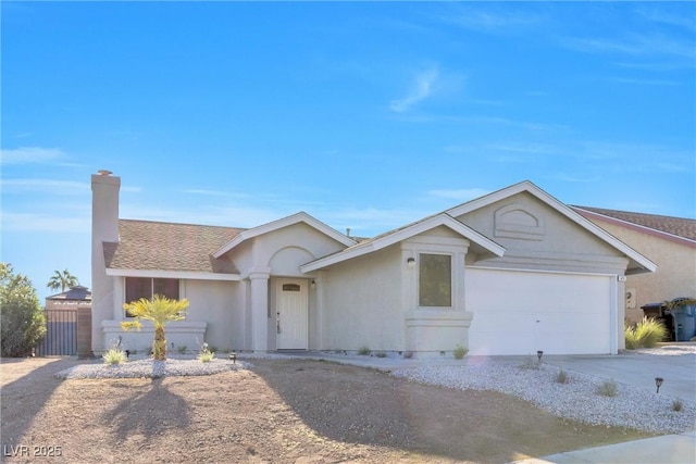 ranch-style home featuring a garage