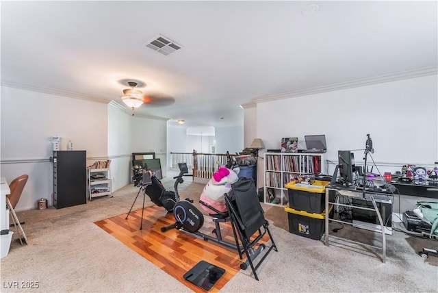 interior space with carpet floors and crown molding