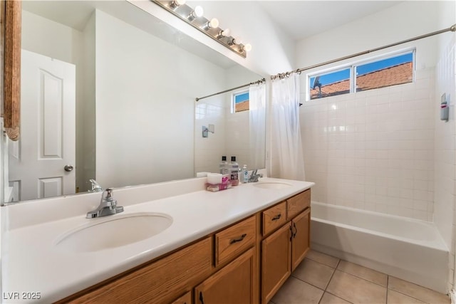 bathroom featuring vanity, tile patterned floors, and shower / bath combo with shower curtain