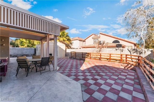 view of patio / terrace with a storage shed