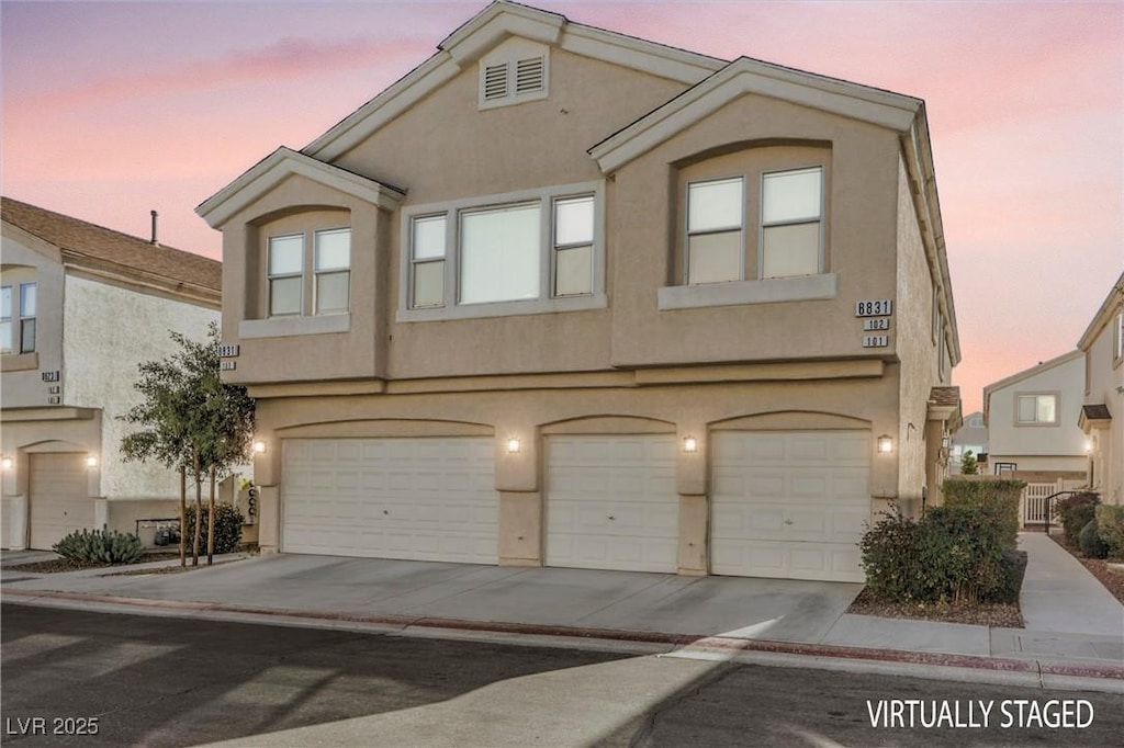 view of property with a garage