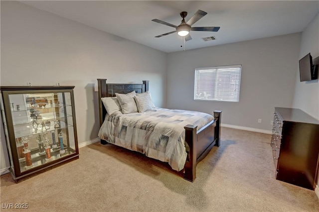 bedroom featuring ceiling fan and light colored carpet